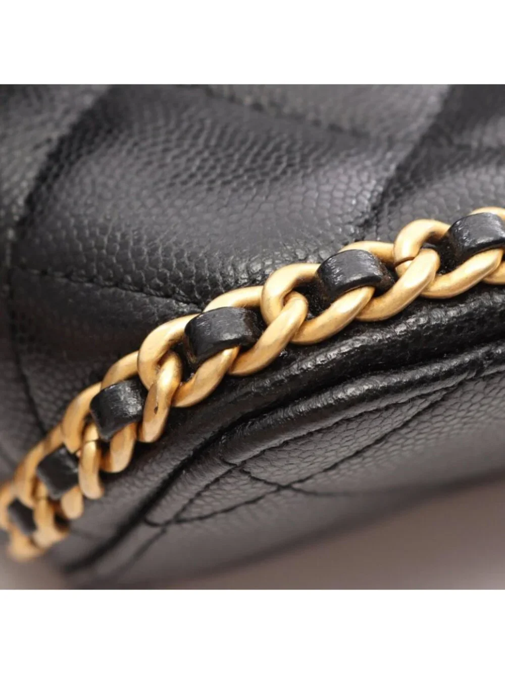 Chanel Backpack Quilted Camellia Black Caviar Leather Chain